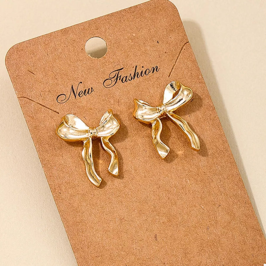 18K Gold-Plated, Alloy Care instructions: Avoid wearing during exercise, as swea earrings in Gold with stud silhouette