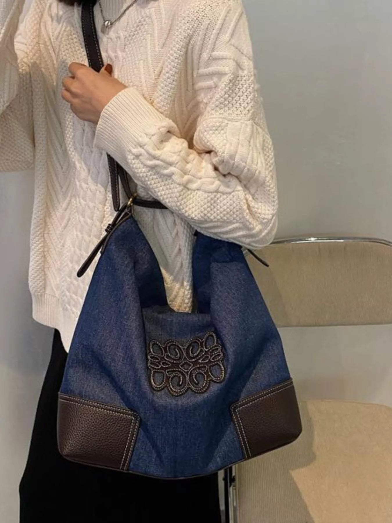 Denim shopper bag with embroidered detail and brown leather accents