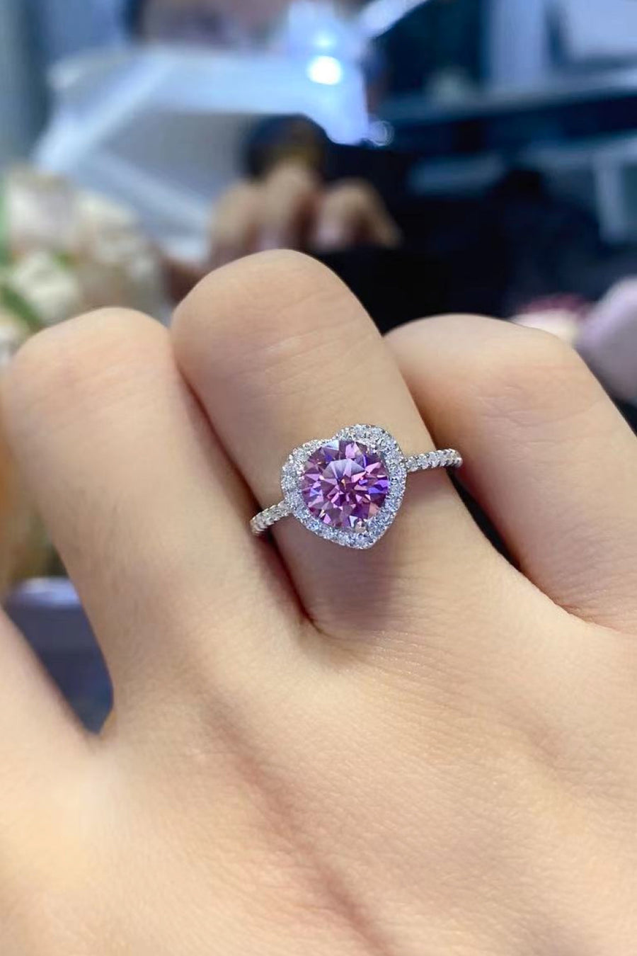 Pink moissanite heart halo ring with diamond band