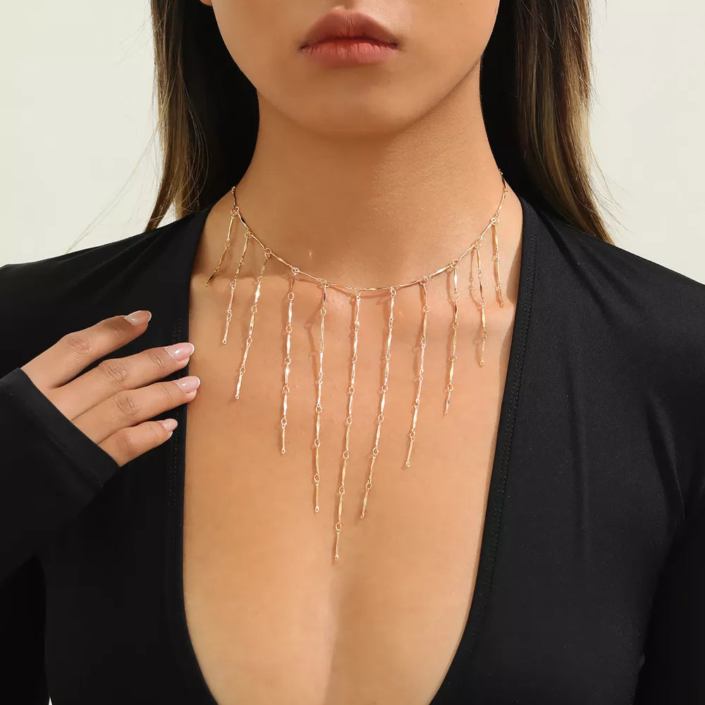 necklace in gold featuring tassel detail and straight fit