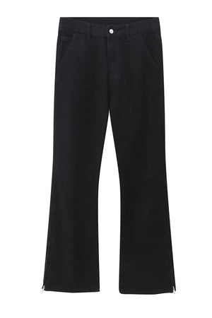 Flared hem denim trousers in dark cotton with zippered ankles.