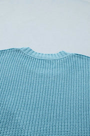 Light blue ribbed knit sweater top with crew neck
