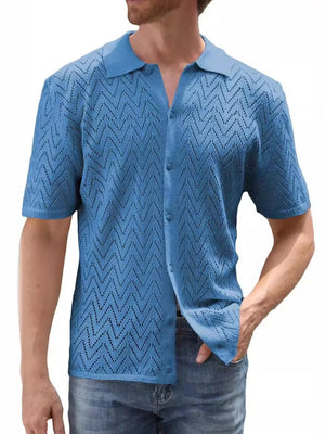 Blue chevron knit polo shirt with short sleeves and button front.