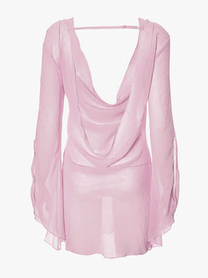 Pink chiffon backless mini dress with draped cowl neck and long sheer sleeves.