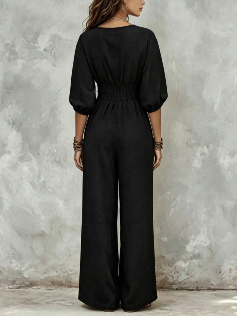 V-Neck Smocked Waist Wide-Leg Jumpsuit in White with drawstring