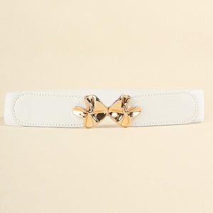 Ivory elasticated waist belt with gold bow clasp detail