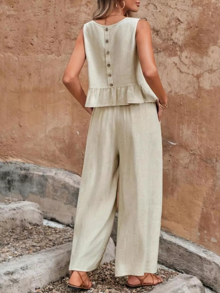 Beige ruffled peplum top with button back and wide-leg pants set