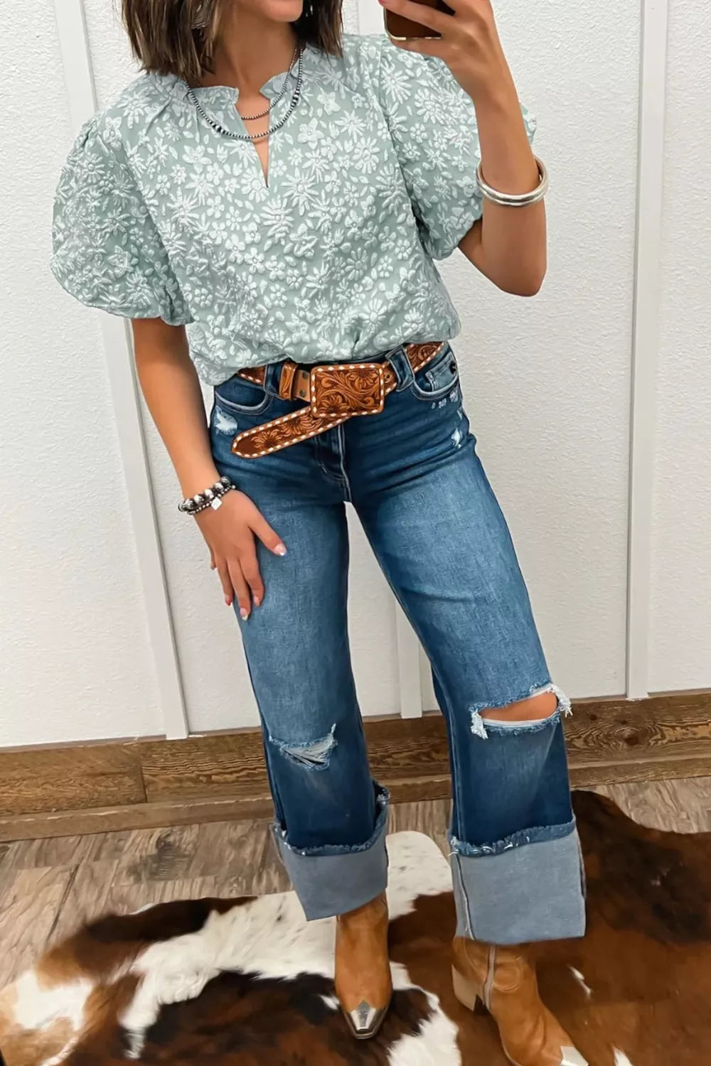 Light blue embroidered floral polyester shirt with puff sleeves and v-neck