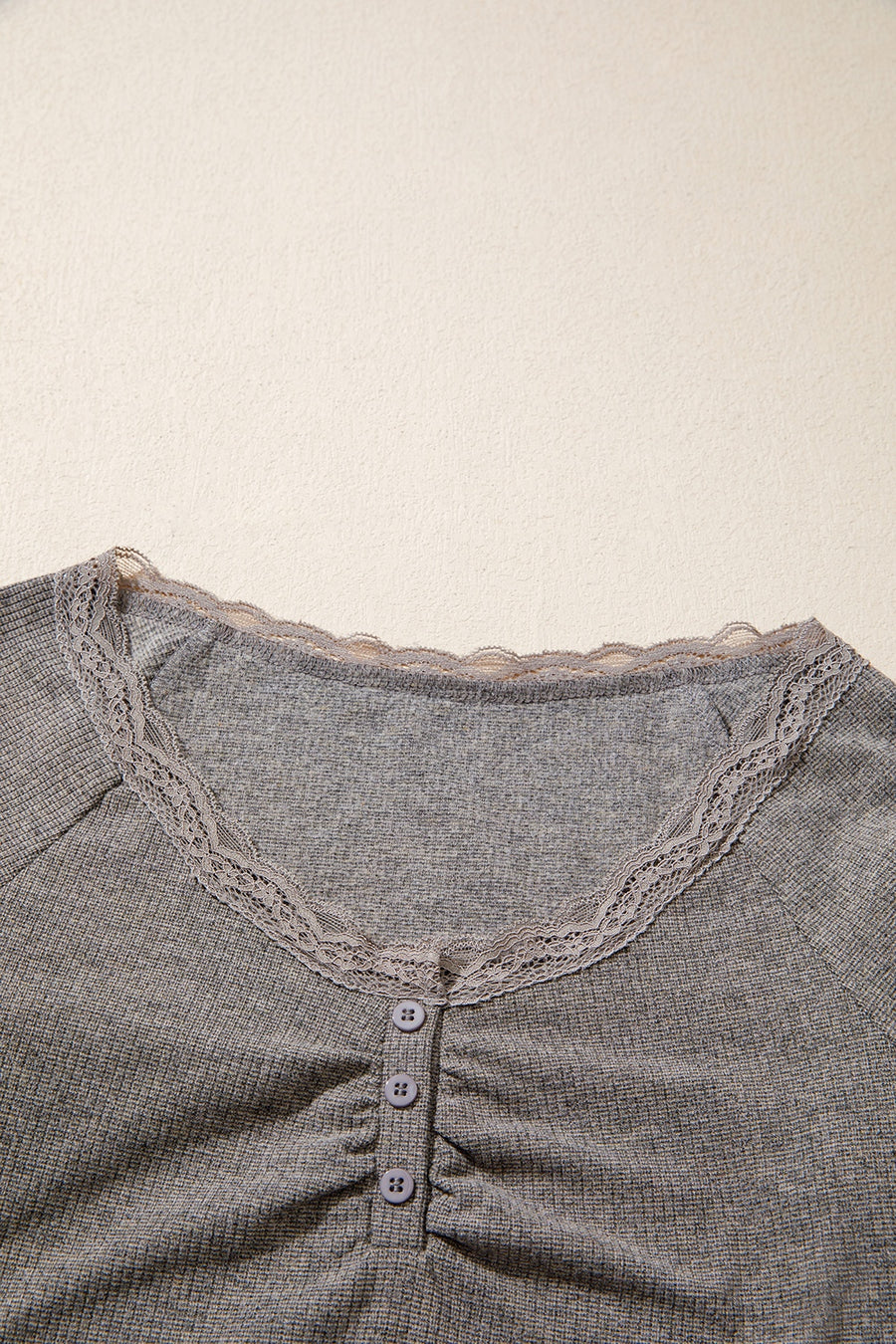 charcoal gray henley with lace detail and long sleeve