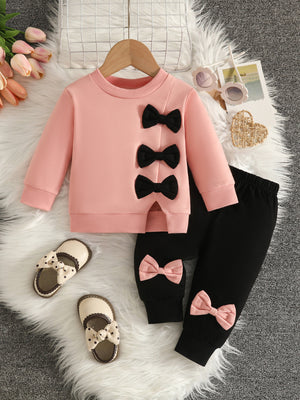 black sweatshirt and pants set with elastic waist and long sleeve