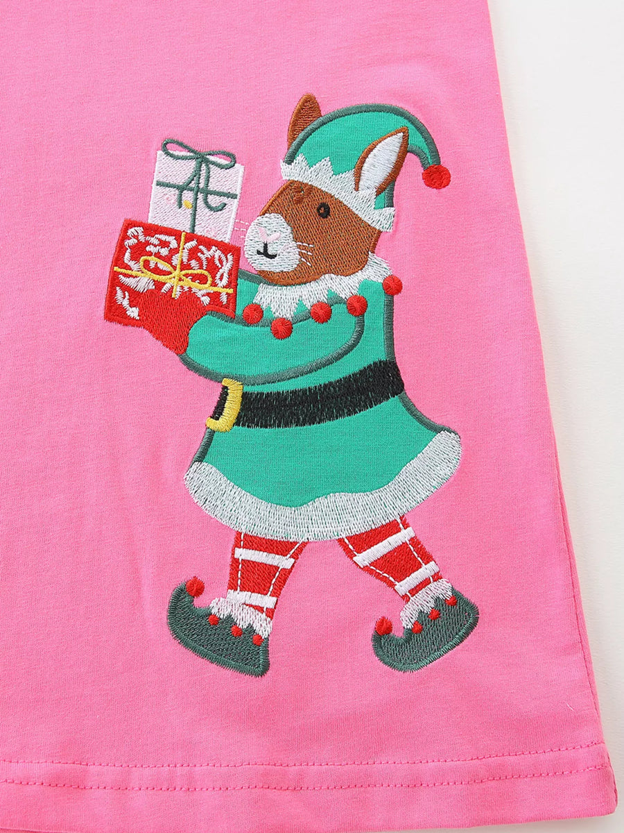 Pink cotton baby dress with embroidered elf holding gifts.