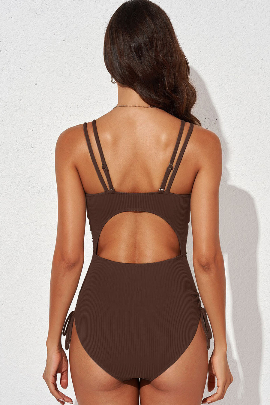 Ribbed one-piece swimsuit in Chestnut with adjustable tie sides and cutout back detail.