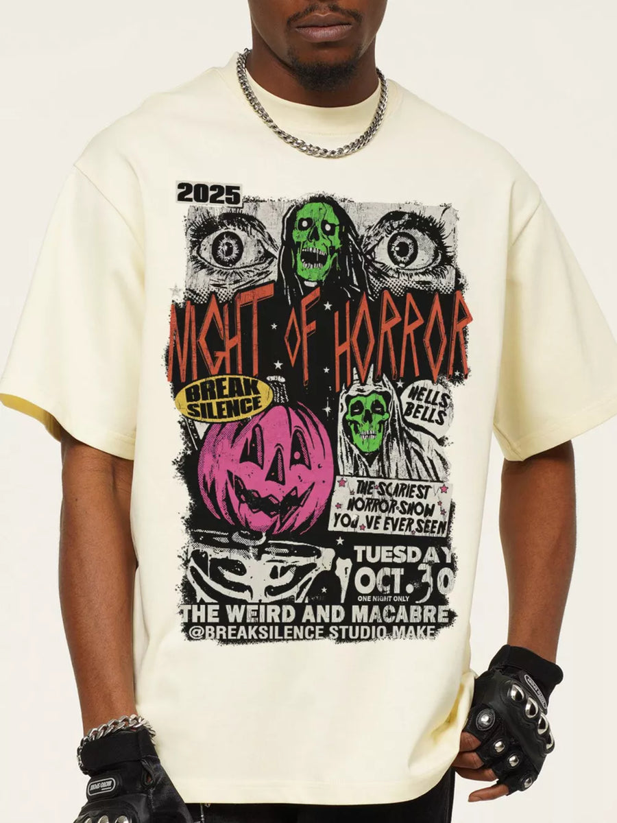 Men's pastel yellow cotton t-shirt with a vintage horror graphic featuring a pumpkin and skulls.