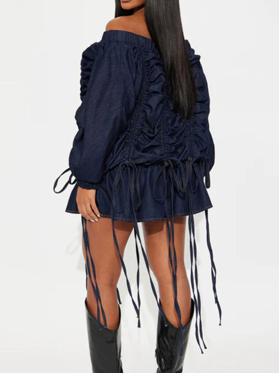 Dark navy denim off-shoulder dress with ruched back and drawstring hem.
