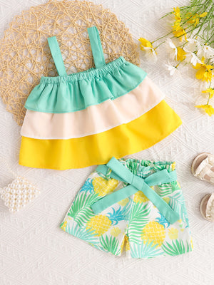 Baby girls tiered ruffle cami and pineapple print shorts set with mint green trim.