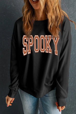 Black sweatshirt with "SPOOKY" graphic in varsity font