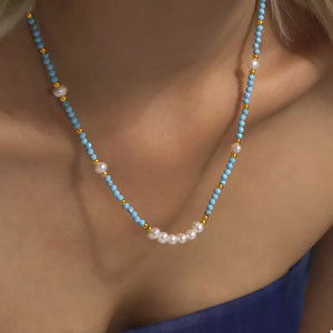 Freshwater Pearl, 18K Gold-Plated, Stainless Steel, Turquoise Care instructions: necklace in ivory with fitted silhouette