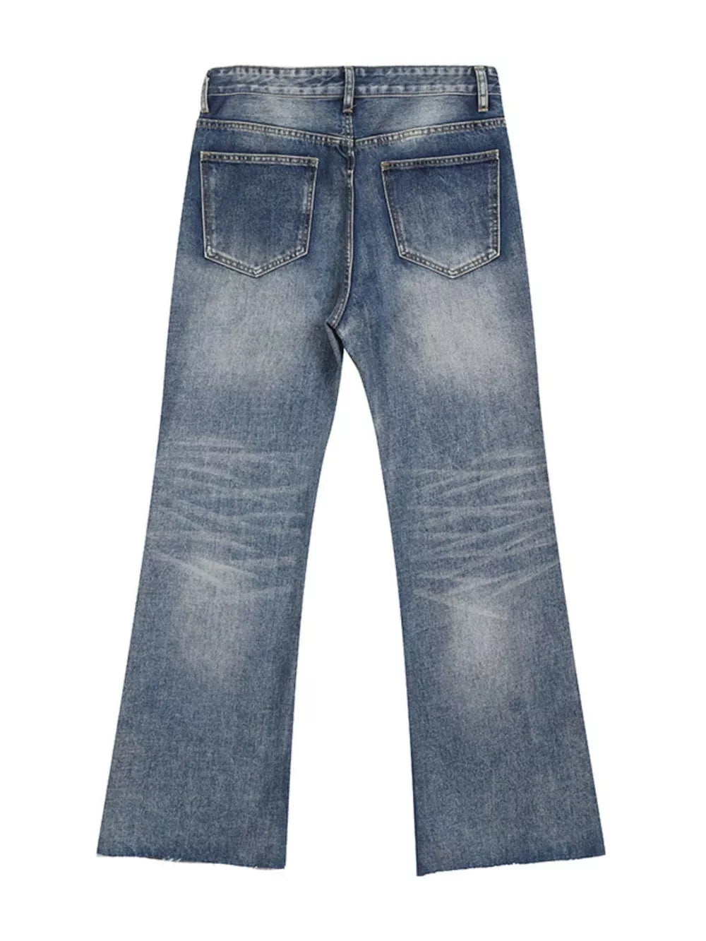 Men's blue wash denim flare jeans with distressed details and raw hem.