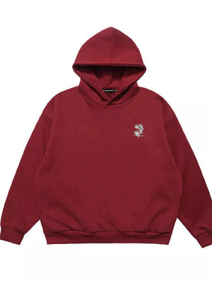 Cherubic Graphic Long Sleeve Sweatshirt in maroon cotton blend with embroidered detail.