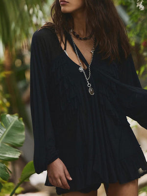 Black sheer ruffle trim beach cover-up with long sleeves and a V-neck.