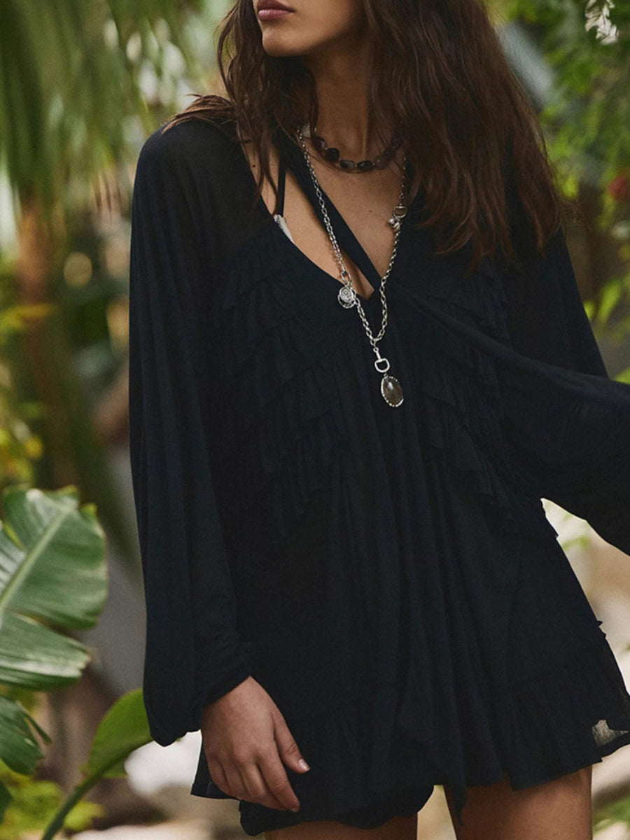 Black sheer ruffle trim beach cover-up with long sleeves and a V-neck.