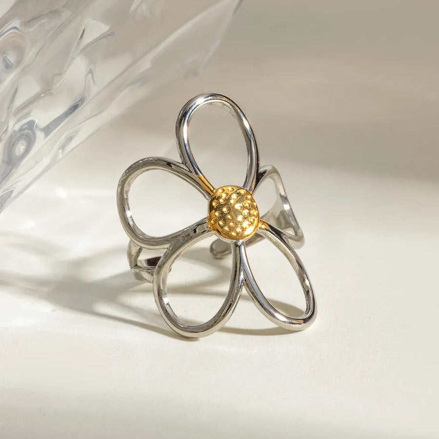 ring featuring floral in gold with mixed metal texture
