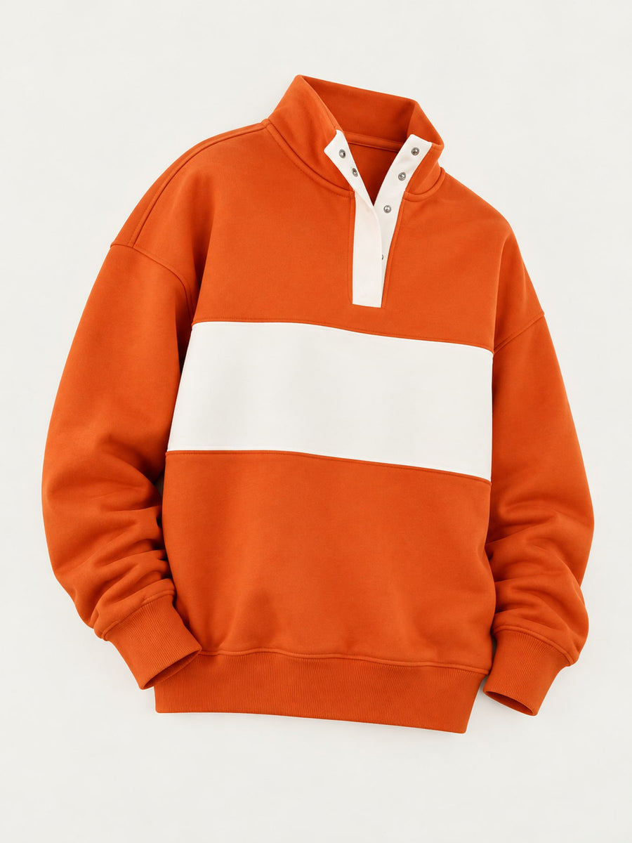 light pink sweatshirt featuring buttoned and color-block, abstract-print