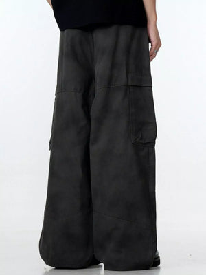 Relaxed fit black cargo pants with multiple pockets and a wide leg.