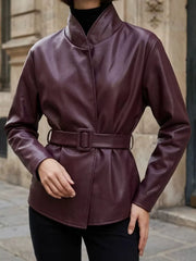 leather jacket in burgundy featuring belted and fitted fit
