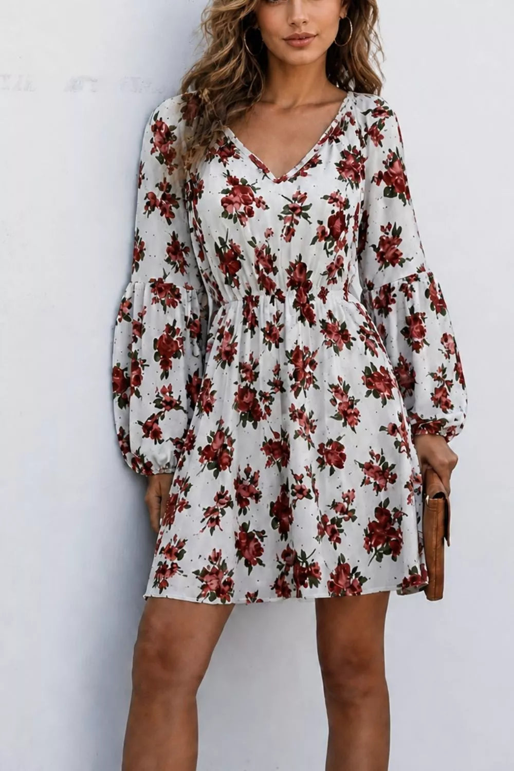 white mini dress with floral and v-neck