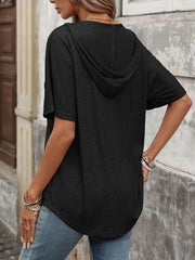 Black relaxed short sleeve hooded t-shirt with a curved hem