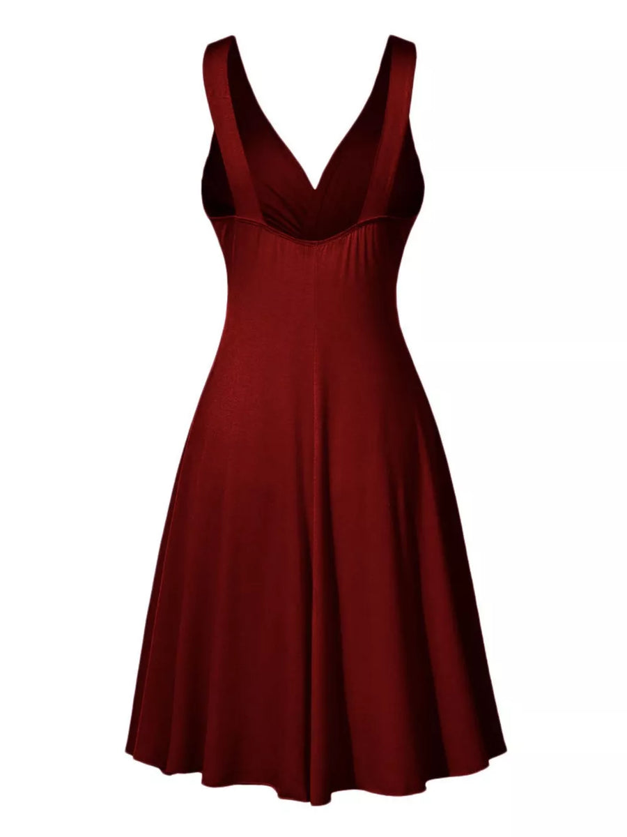 100% polyester Care instructions: Machine wash cold A-line dress in Burgundy with A-line silhouette