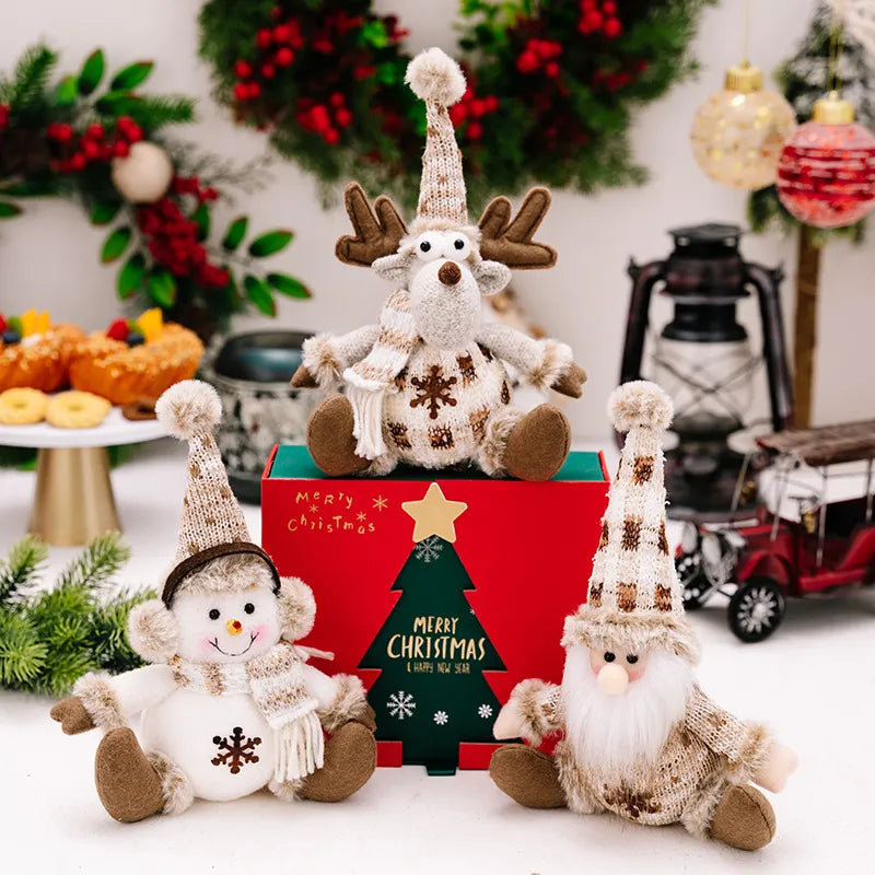 Christmas knit ornaments: reindeer, snowman, and Santa figures in brown and white plaid with snowflake details.