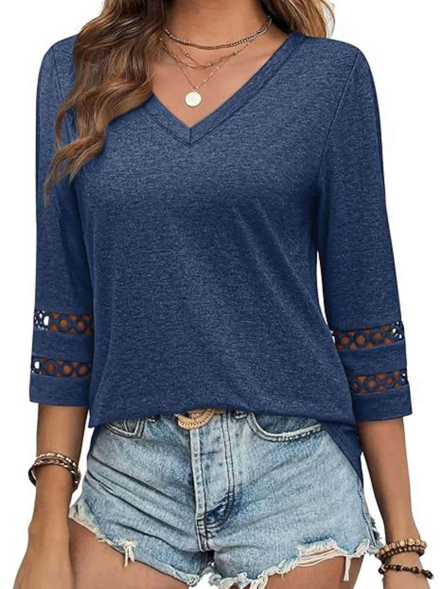 Blue V-neck t-shirt with 3/4 sleeves featuring cutout details on the cuffs.
