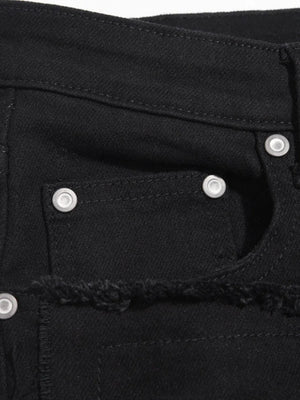 Black denim jeans with frayed hem detail and silver hardware.