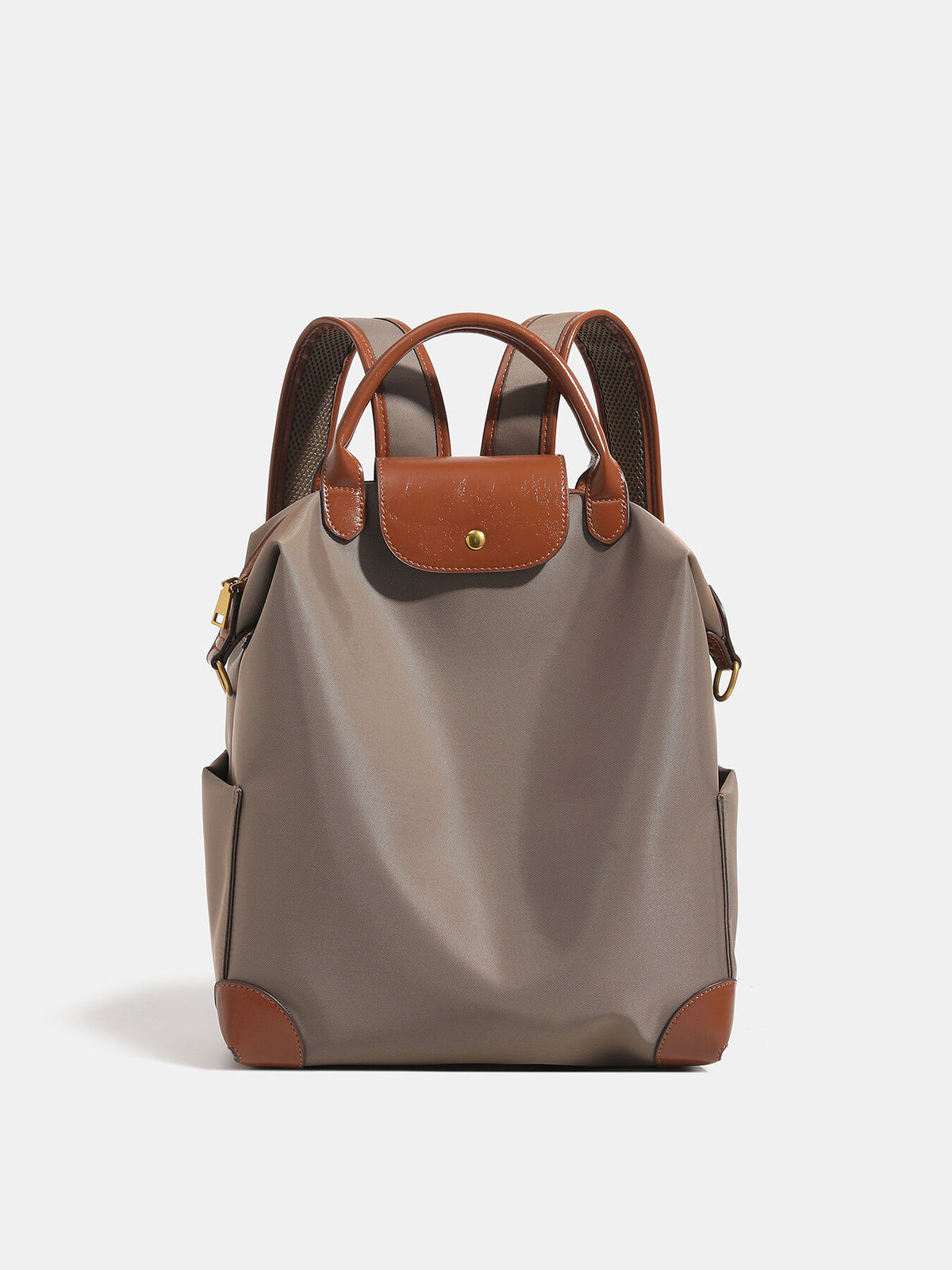 backpack in taupe featuring top handle and structured fit