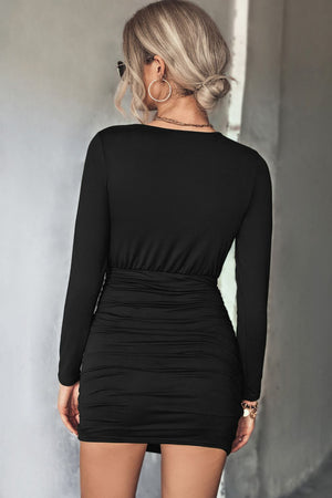 Black long sleeve ruched bodycon mini dress with knot front detail