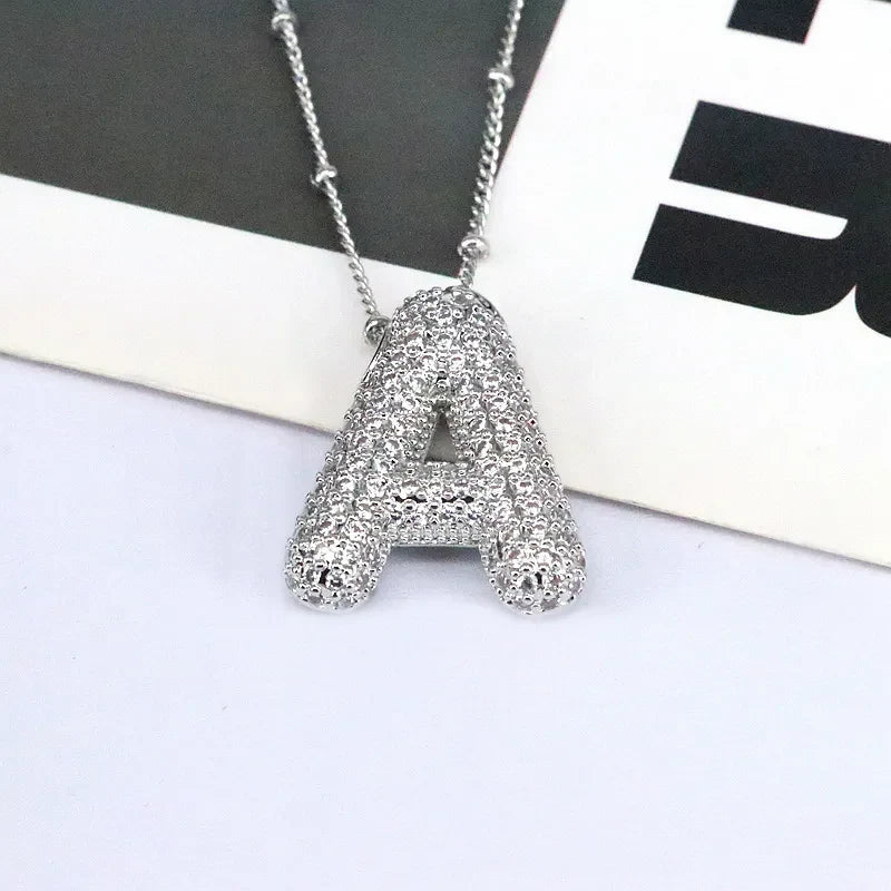 Silver bubble initial A necklace paved with clear crystals on a delicate chain