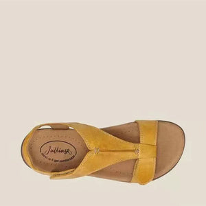 Yellow leather T-strap comfort sandals with a cushioned footbed.