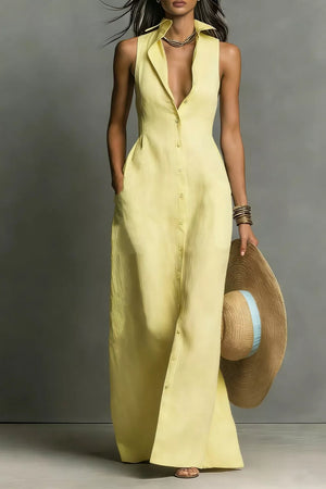 Chic pastel yellow sleeveless maxi dress with button front and pockets.