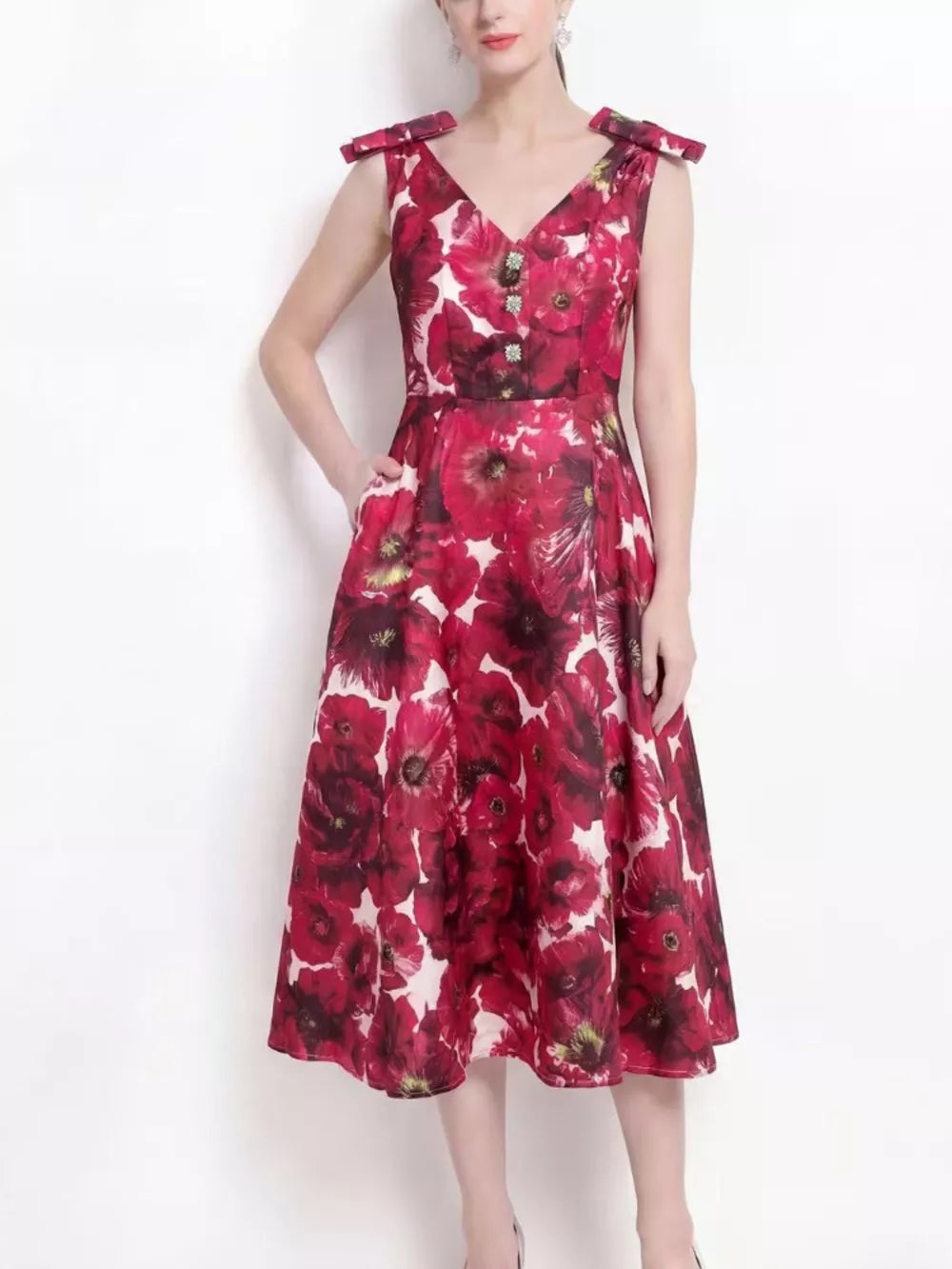 Floral print midi dress with bow shoulder details and V-neck.
