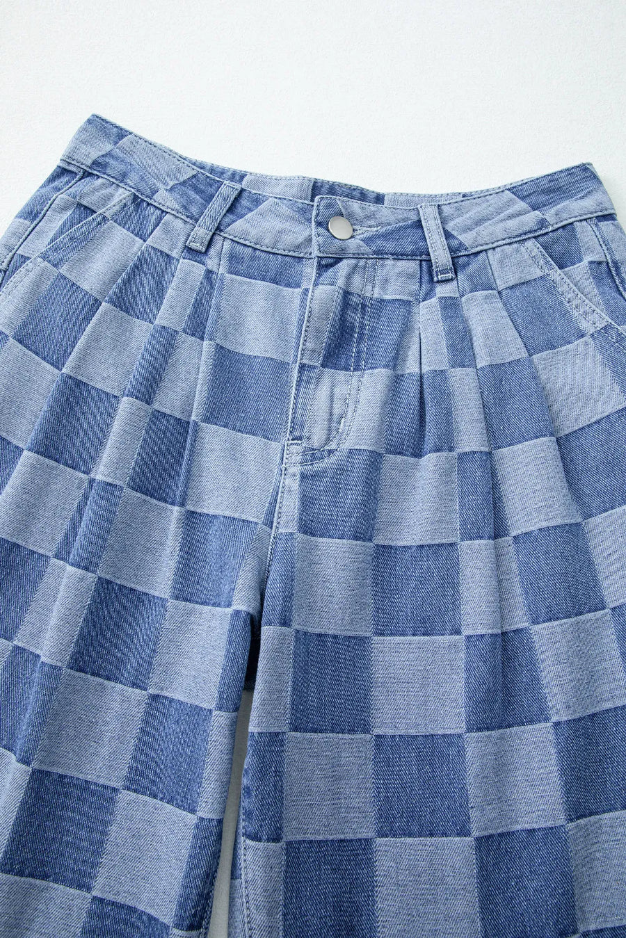 Checkerboard denim wide leg trousers in dusty blue with pleated front detail.