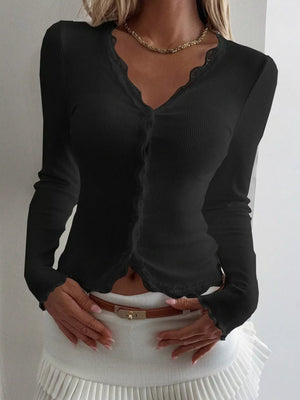 Black ribbed long sleeve top with button front and lace trim neckline and hem.