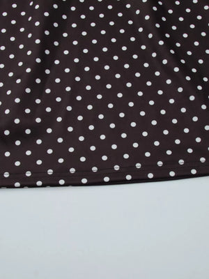 Brown polka dot mini dress with a cut-out detail