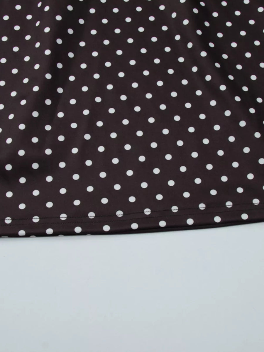 Brown polka dot mini dress with a cut-out detail