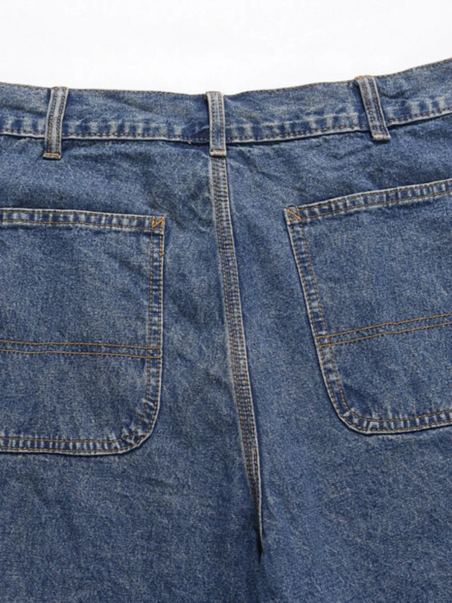 Carpenter denim bermuda shorts in medium wash with double-stitched back pockets.