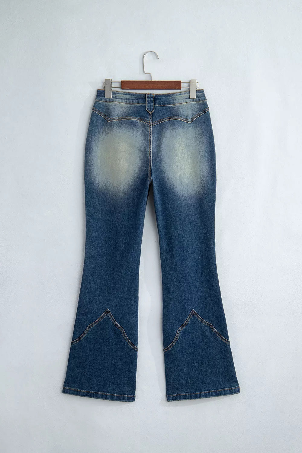 flare jeans in medium wash blue with pocketed and full-length