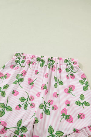 Pink striped pajama shorts with a strawberry print and ruffled hem.