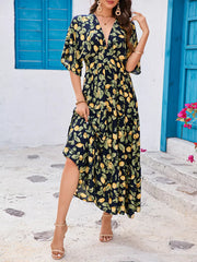 Lemon Leaf Print V-neck Midi Dress in Black Forest with flutter sleeves and tiered skirt.