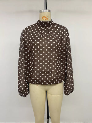 100% polyester Care instructions: Machine wash cold blouse in white with relaxed silhouette